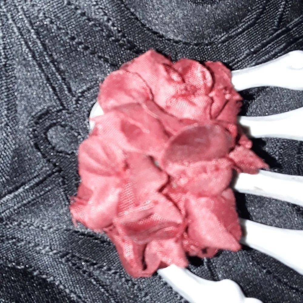 Skeleton hand rose hair clip